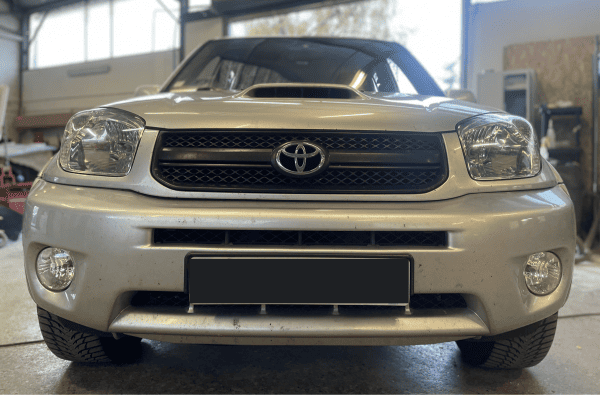 Après rénovation polissage optiques phares 4x4 Toyota carrosserie Voreppe 38